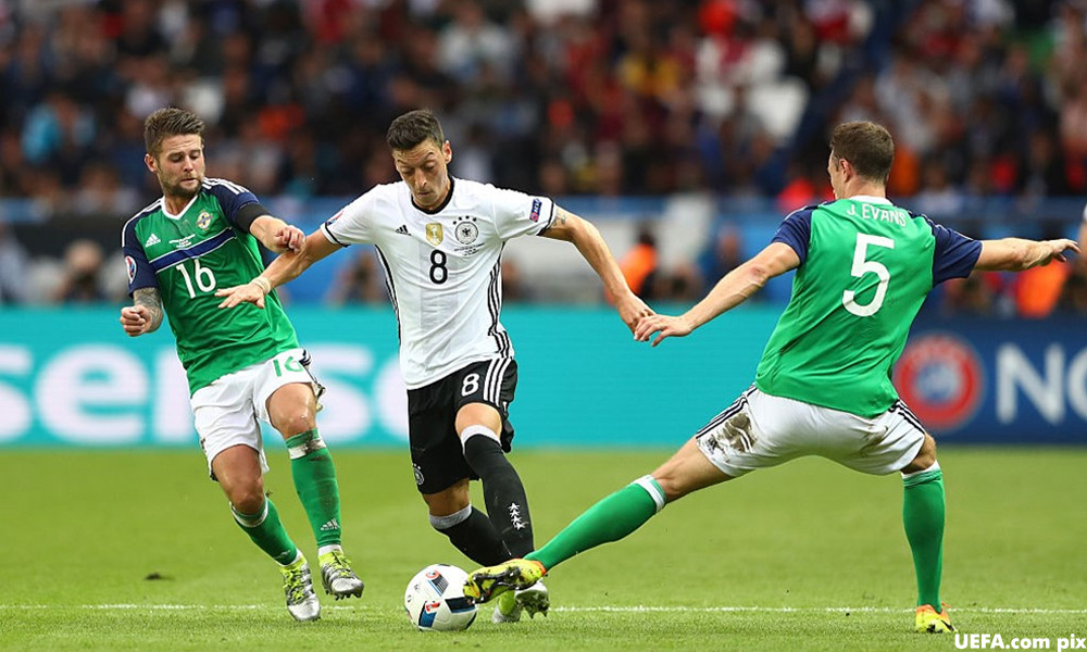 Germany beat N Ireland to advance as group winners