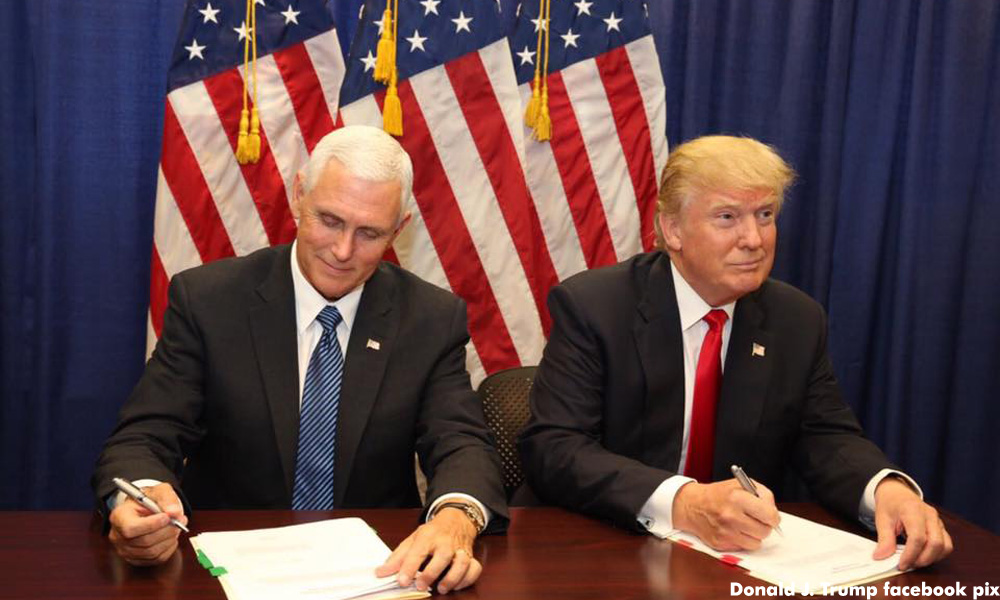 Trump eyes loyal backers for cabinet while transition hits a snag