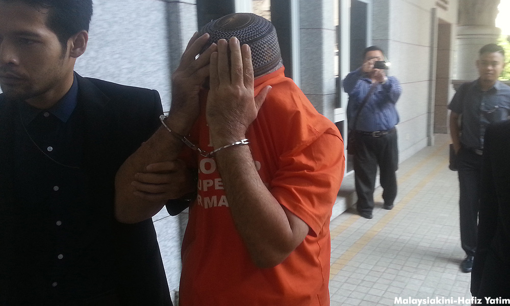 'Datuk' remanded for taking kickbacks from logging