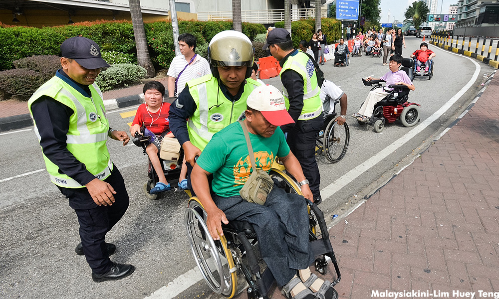 Wheelchair users gather at Mid Valley to press for better accessibility