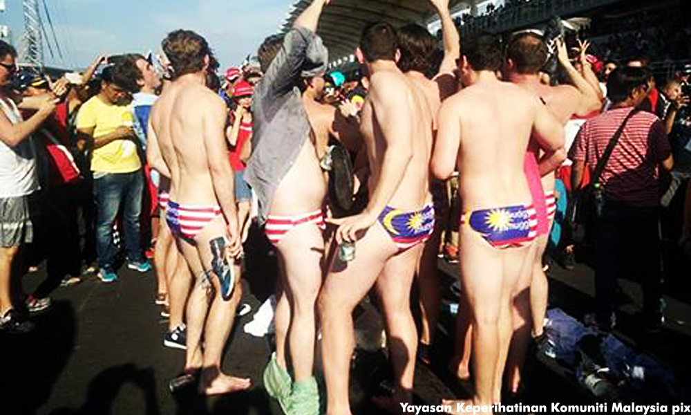 Men detained for stripping down to Jalur Gemilang underwear at F1