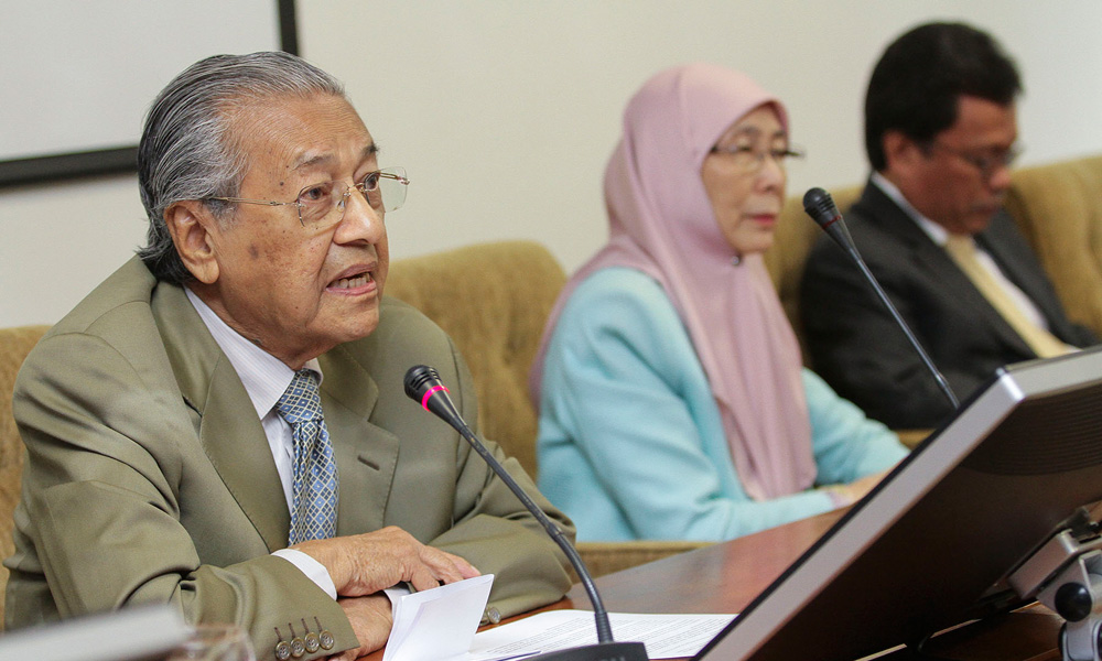 PAS snubs Harapan convention; S'pore looking for Jho Low