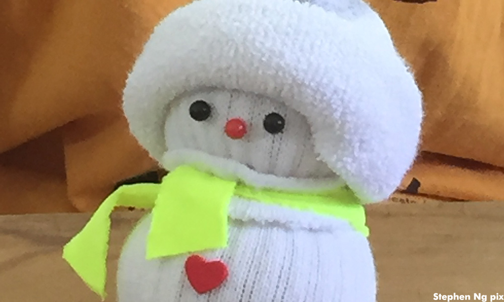 ‘Turning socks into snowmen’ project teaches young about charity