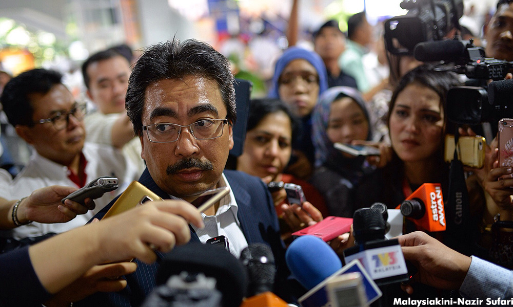 Minister hails conviction of Jho Low's ex-banker; Najib wants in on Ambank suit