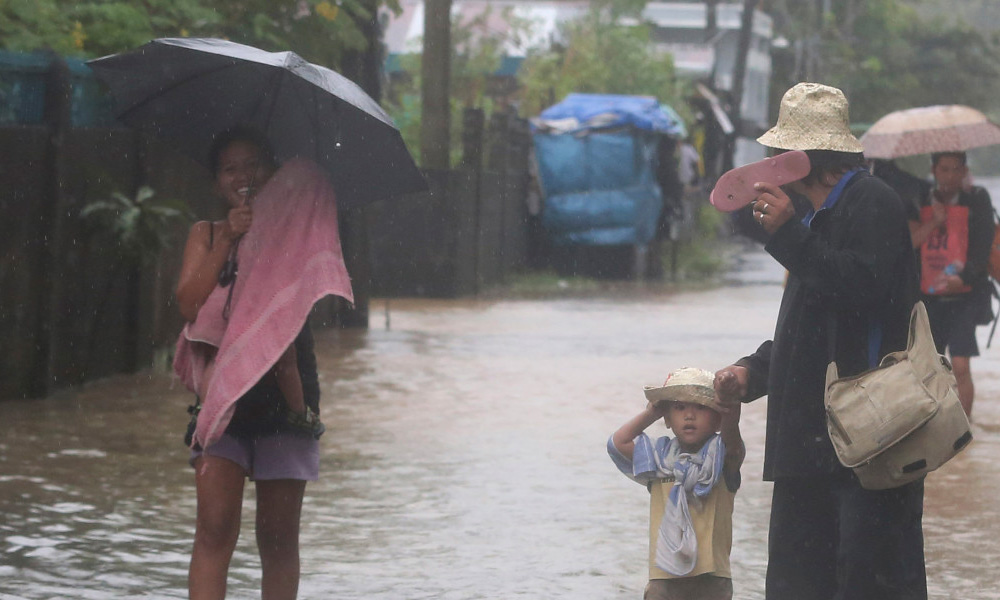 Typhoon eases, but Philippines braces for floods, mudslides