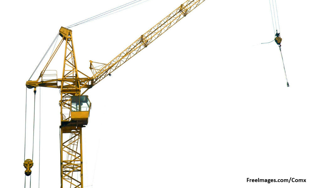 Man hurt after construction crane collapses onto lorry in Perak