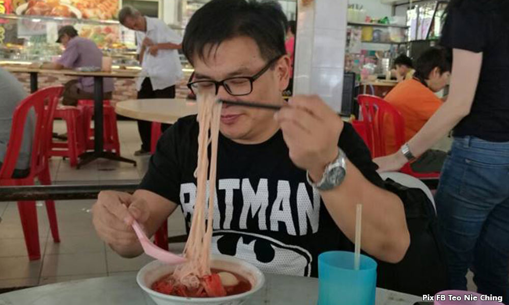 'Superman' freed, feasts on noodles donning 'Batman' T-shirt