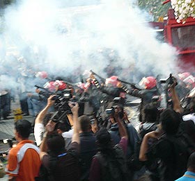 hindraf march of roses parliament 160208 tear gas fury