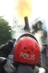 hindraf march of roses parliament 160208 tear gas