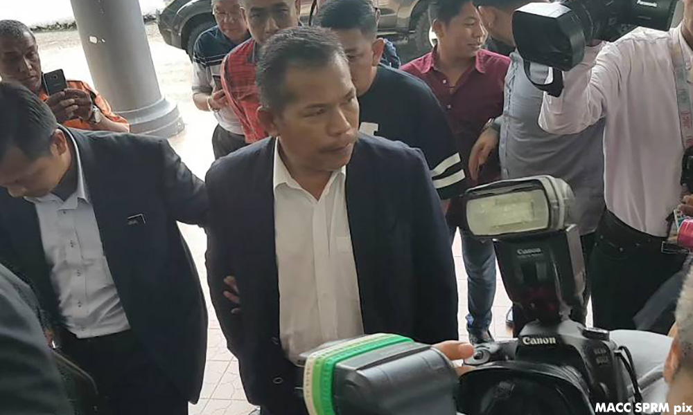 Former aide to Malacca mayor charged with laundering RM19.3m