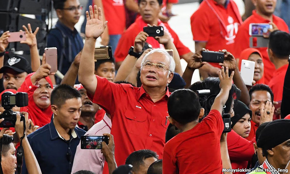 Drama overshadows Umno show of force; possible multi-cornered fight with PAS