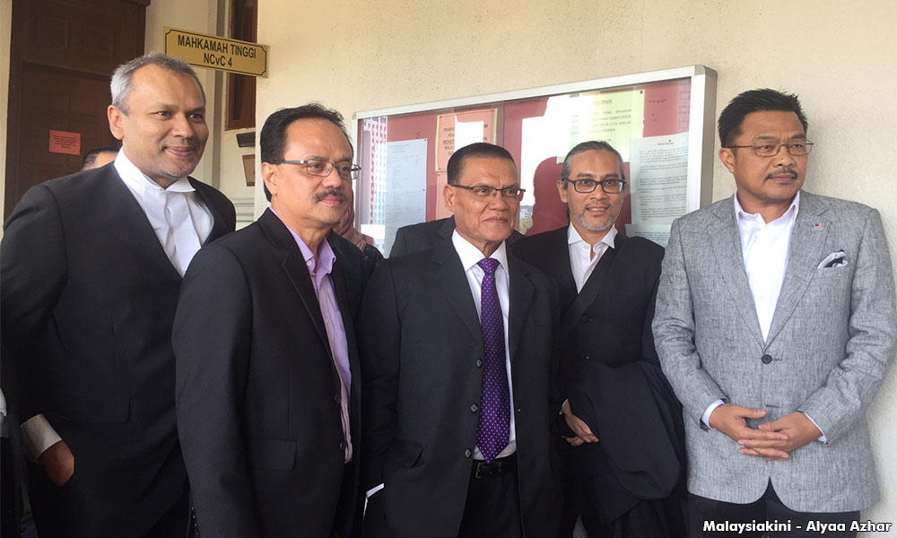 Adnan, Utusan settle suit out of court