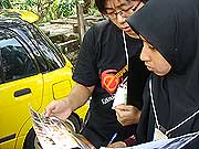 exposure trip 020308 participance taking a look at the leaflet