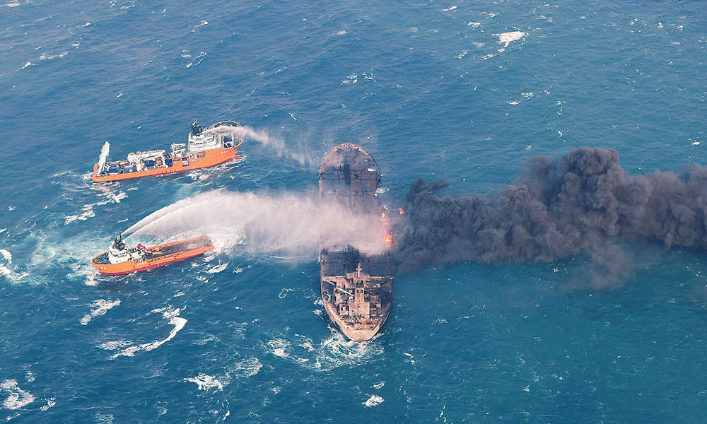China says sunken Iranian tanker may now be leaking heavy oil