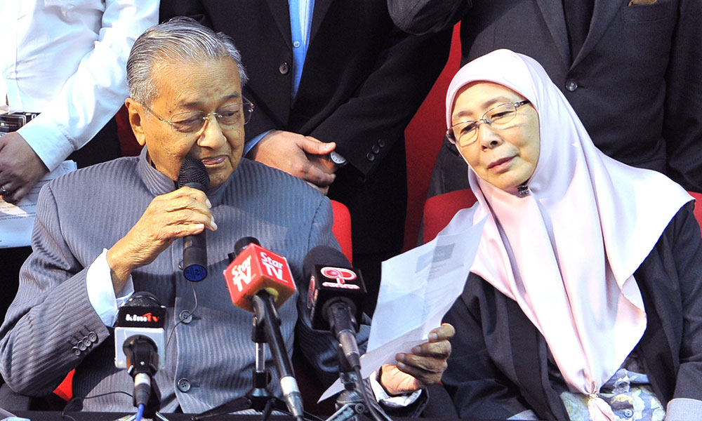 Dr M promises bigger role for women; ulama doubts Indira can raise Muslim child