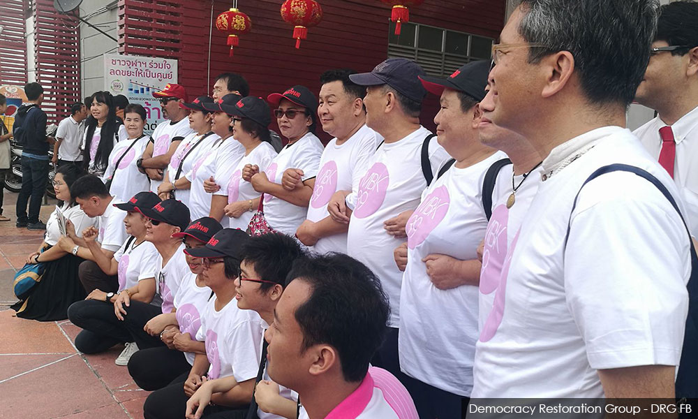 Thirty-five Thai activists face police after junta protest