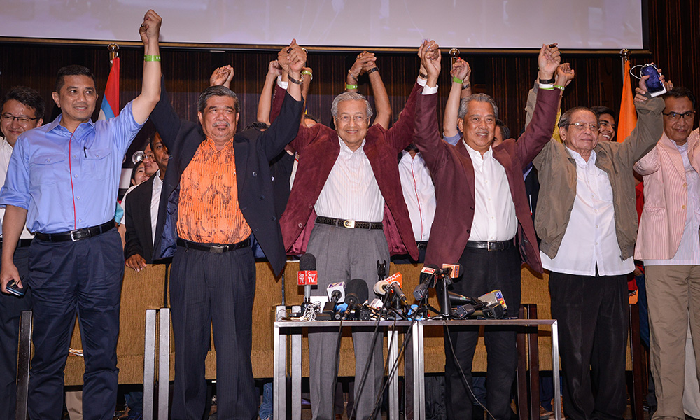 Pakatan Harapan leaders announcing their victory on the night of the GE14 polling day.