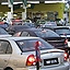 petrol price hike car queing to buy petrol
