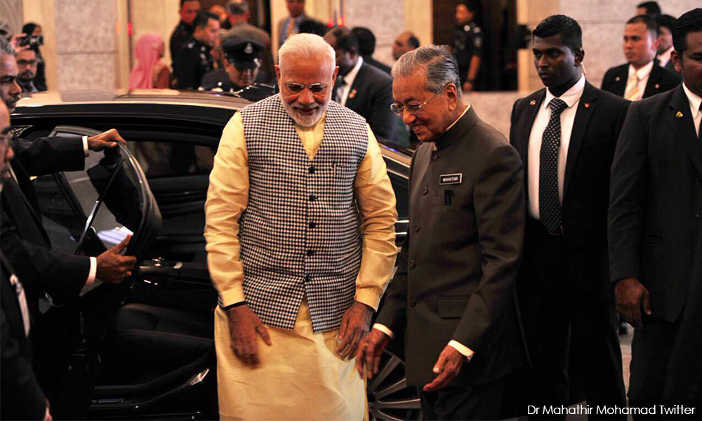 Indian PM Modi calls on Dr M