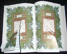 defaced quran book 200608