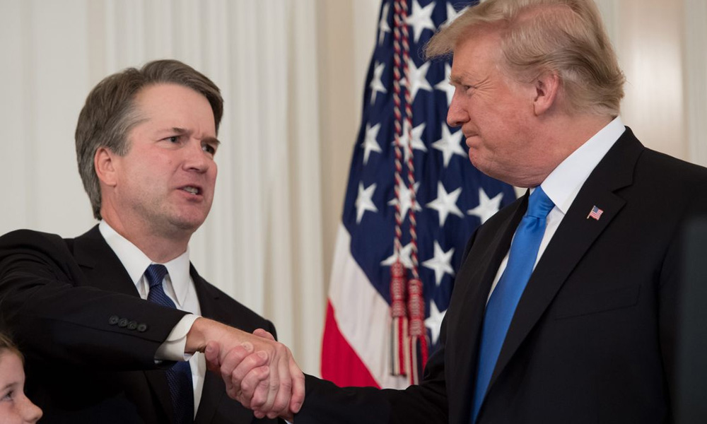 After fight that split US, Kavanaugh wins place on Supreme Court