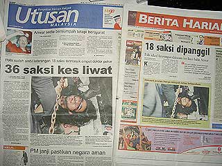 newspaper on protes 070708 utusan and berita harian frontpage