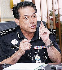 bakri zinin police cid chief