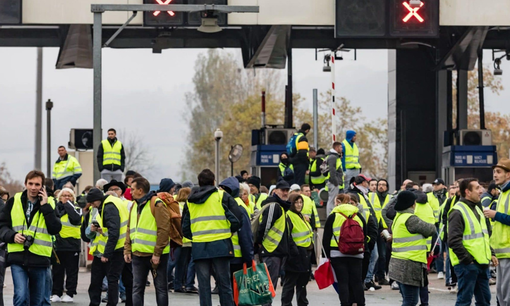 Chaos on French highways as 'yellow vests' torch toll booths