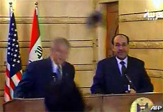 muntazer al zaidi george w bush shoe thrown incident iraq 171208 03