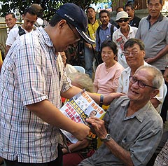 kt by election 070109 wan farid greet voters