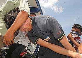 yap sin tian beaten case surrender 130109 suspect 02 blur