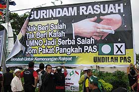 kuala terengganu by election dispute over poster 140109 01