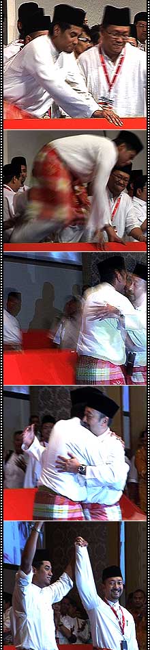 khairy jamaluddin jump over to hug mukhriz mahathir after winning umno youth chief 2009 contest 260309