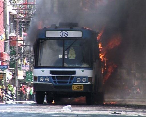 Thai troops battle protesters in Bangkok streets.