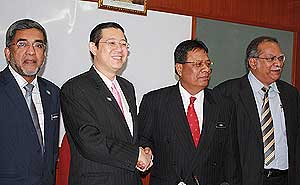 guan eng and new state secretary zainal rahim 210409