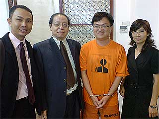 wong chin huat arrested one black malaysia campaign court orange shirt 060509