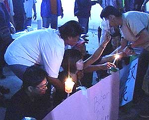 dap members arrest at teresa kok candle light vigil 190509 08