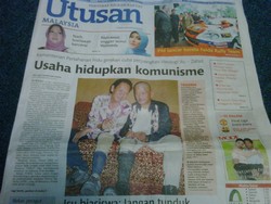 utusan front page on communism 270509