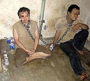 chained loan shark victims 280509