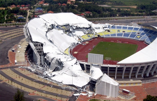collapsed half of roof of the Sultan Mizan Zainal Abidin Stadium in Kuala Terengganu