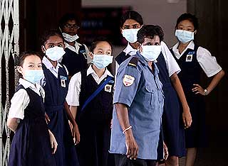 h1n1 flu malaysia school children students wearing mask 260609 01