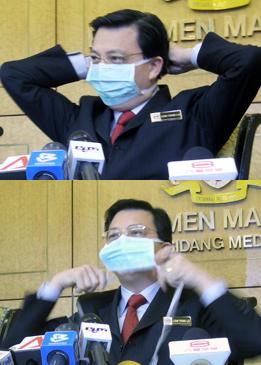 health minister show how to wear mask properly 020709 liow tiong lai