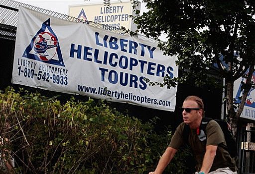 Helicopter crashed with light plane over New York's Hudson River