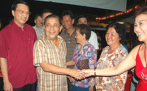 mca karaoke competition 071009 shaking hands