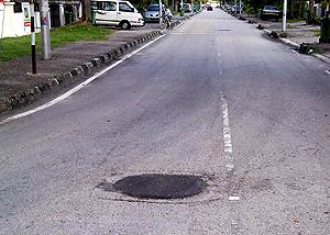 hole in road penang 211209