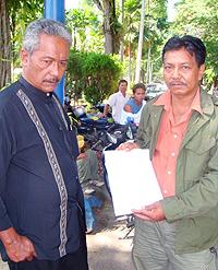 police report on vote buying 300410 01 othman moin and chambah mohamad