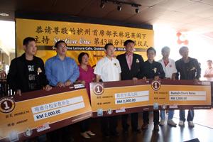 lim guan eng witnes magnum charity ceremony