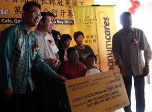 lim guan eng witness magnum mock cheque