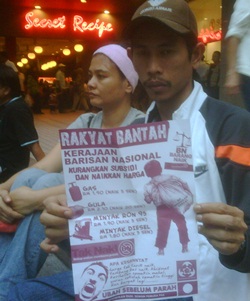 pas handing out leaflets on price hikes 5