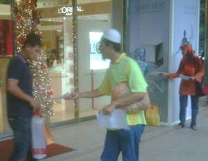 pas handing out leaflets on price hikes